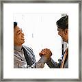 Two Men Shaking Hands, Side View Framed Print