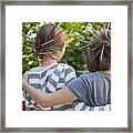 Two Young Girls Embracing Each Other Framed Print