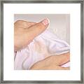 Wash a stain on white clothes under water stain Framed Print