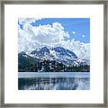 White Billowy Clouds Over Gull Lake Framed Print