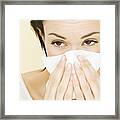 Woman Blowing Nose, Close-up Framed Print