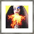 Woman Breathing Fire From Mouth Framed Print