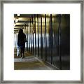 Woman Carrying Shopping Walking Through Underpass Framed Print