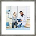 Woman Discussing Health Issues With Gynecologist Framed Print