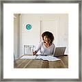 Woman Doing Finances At Home Framed Print