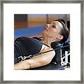 Woman Exercising On Pilates Reformer Framed Print