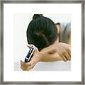 Woman Holding Electronic Organizer, Resting Head On Arms Framed Print