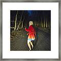 Woman Running In Fear In Woods At Night Framed Print