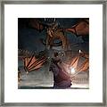 Woman With A Lantern Facing Dragons Framed Print