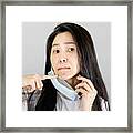 Young Asian Woman Wearing Medical Face Mask And White T Shirt. Isolated On Gray Background,health Care Concept Framed Print