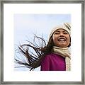 Young Hispanic Girl Wearing Hat And Scarf Outdoors Framed Print