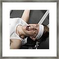 Young Man Lifting Weight, Overhead View, Close-up Framed Print