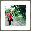 Young Overweight Woman Running Framed Print