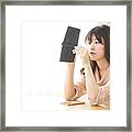 Young Woman Figuring Domestic Accounts Framed Print