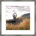 Young Woman Preforms Yoga In Mountains In Morning Light Framed Print