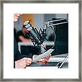 Young Woman Recording A Podcast In A Studio, Close-up. Framed Print