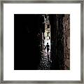 Young Woman Walks Alone Through Spooky Narrow Abandoned Alley In The Night Framed Print