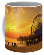 Visitors enjoy sunset above Santa Monica Pier in Los Angeles
