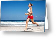 Healthy woman running on the beach Photograph by Anna Om - Fine Art America