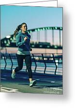 Woman Jogging In City At Night by Microgen Images/science Photo Library