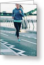 Woman Jogging In City At Night #1 by Microgen Images/science Photo Library