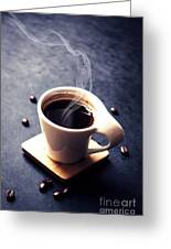 Morning small cup of coffee or espresso drink with steam aroma r