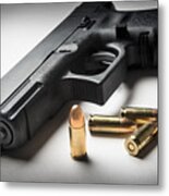 9mm Handgun With Bullets Metal Print