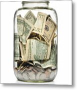 A Clear Glass Jar Filled With Cash And Coins Metal Print