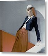 A Model Leaning On A Wall Metal Print