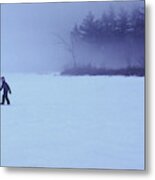A Young Boy Walks Across The Frozen Metal Print
