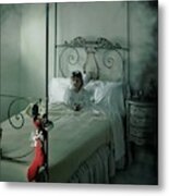 A Young Girl Lying On A Bed Metal Print