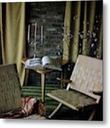 An Armchair Beside A Table And An Old Book Metal Print