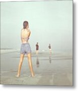 Back View Of Three People At A Beach Metal Print