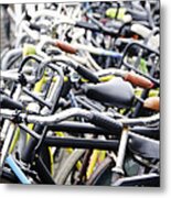 Bicyles Parked Along The Street Metal Print