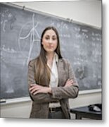 Caucasian Woman With Arms Crossed In Classroom Metal Print