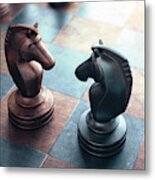 Chess Pieces On A Chess Board Metal Print