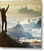 Climber Standing On A Mountain Summit Metal Print