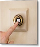 Close-up Of A Person's Hand Ringing Door Bell Metal Print