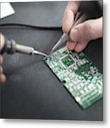 Close Up Of Engineer Soldering Prototype Circuit Board Metal Print