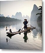 Fisherman With Cormorants On River Metal Print