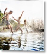 Friends Splashing In Water At Lake Together Metal Print