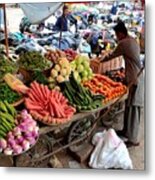 Fruit And Vegetable Seller Tends To His Cart Outside Empress Market Karachi Pakistan Metal Print