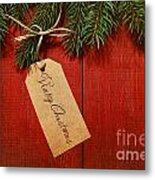 Gift Tag On Red Wood Background Metal Print