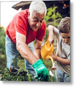 Grandfather And Grandson In Garden Metal Print