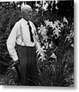 Hans Peter Sass Standing Beside A Flowering Plant Metal Print