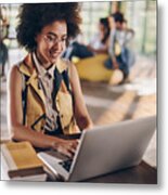 Happy African American Student Studying While Using Laptop. Metal Print