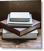 High Angle Close Up Of Stack Of Book S On Wooden Table. Metal Print