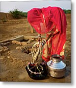 Indian Woman Getting Water From The Metal Print