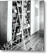 Ladder By Shelves Metal Print