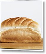 Loaf Of Bread On Chopping Board, Close-up Metal Print